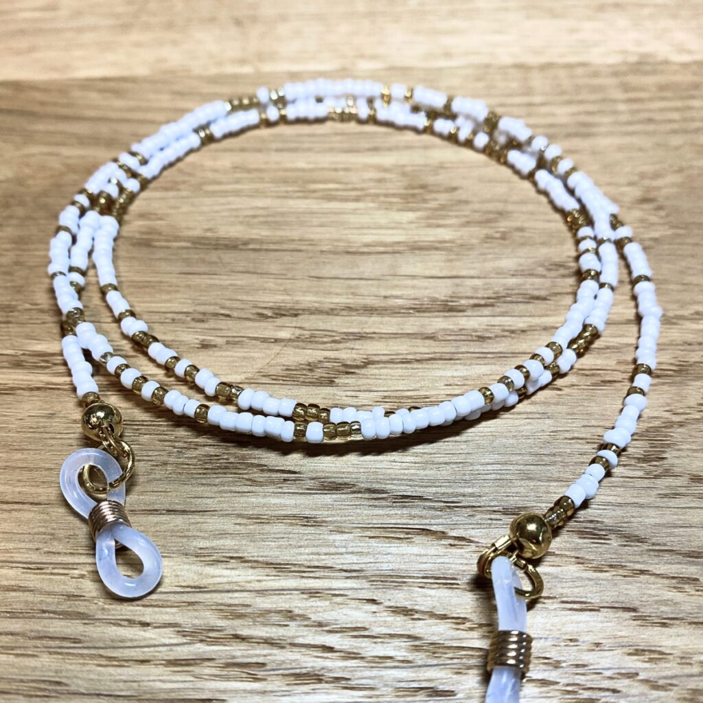 Brillenband in weiss und gold
